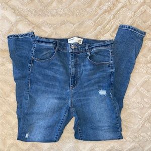 Garage distressed skinny jeans